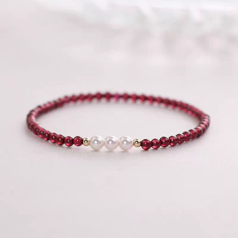 KarmaRipple's Authentic Small Garnet Pearl Beadwork Protection Bracelet p1