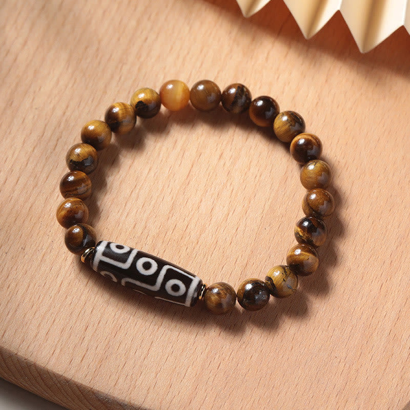KarmaRipple's Tibetan Tiger Eye Tourmaline Nine-Eye Dzi Bead Protection Bracelet p1