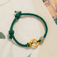 KarmaRipples 999 Sterling Silber Peace Buckle Hetian Jade Bead Fortune Green Rope Woven Armband
