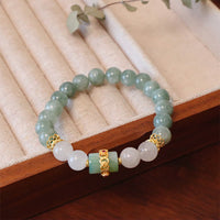 KarmaRipples ein- und doppellagiges Jade-Armband mit Friedensschnalle und Glückssymbol