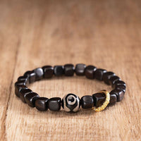 KarmaRipples tibetisches Ebenholz-Dzi-Perlen-Balance-Calm-Armband