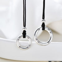 KarmaRipples Halskette mit Schutzanhänger „Peace Buckle“ aus 999er Sterlingsilber