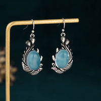 KarmaRipple's Ohrringe aus 925er Sterlingsilber mit blauen Chalcedon-Koi-Fischen und Vitalitätsstiftern