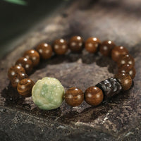 KarmaRipples Sandelholz-Bodhi-Samen-PiXiu-Ausgleichsarmband aus Ebenholzperlen