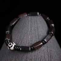 KarmaRipples rechteckiges Dzi-Perlen-Balance-Armband aus Ebenholz