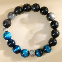 KarmaRipples blaues Tigerauge-Armband mit silberglänzendem Obsidian
