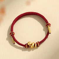 KarmaRipples handgefertigtes gewebtes Armband „Golden Year of Snake“ aus 999 Sterlingsilber mit roter Schnur zum Schutz