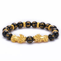 KarmaRipples Armband aus schwarzem Obsidian, schwarzem Onyx und goldener Legierung mit zwei PiXiu, Om Mani Padme Hum Stärke