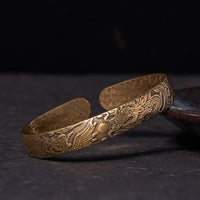 KarmaRipples Armreif mit Drachen und Phönix, die mit einer Perle spielen, geschnitztes Bronze-Messing-Armband zum Schutz des Glücks