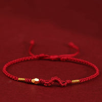 KarmaRipples 999 Gold „Jahr der Schlange“ Mini-Goldperle, handgefertigt, Glücksschutz, geflochtenes Armband