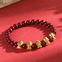 KarmaRipples Zinnober-Armband aus 999er Sterlingsilber mit Fu-Charaktermünze und Goldbarren, Jahr der Schlange, Ruhe