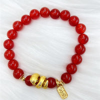 KarmaRipples Armband „Friede und Freude“ aus roter Achat, vergoldete Bronze, Jahr der Schlange, Vertrauensarmband 