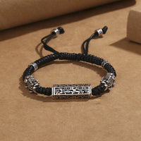 KarmaRipples tibetisches schwarzes Armband aus Bronze mit Om Mani Padme Hum Pixiu-Schutz, gewebt