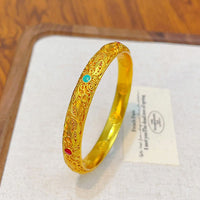 KarmaRipple's Armreif mit bronzefarbenem Gold und Blumenblättern