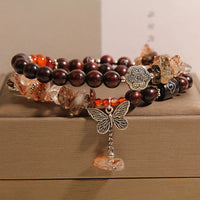 KarmaRipples authentisches Rutilquarz-Armband mit kleinen Blättern, rotem Sandelholz und Schmetterlings-Talisman