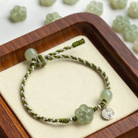 KarmaRipples handgefertigtes gewebtes Armband aus Pflaumenblüten-Jade für Glück und Wohlstand