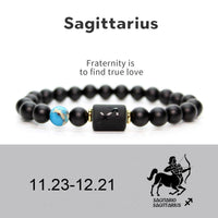 Verstellbares Armband aus schwarzem Onyx mit den 12 Sternbildern des Tierkreises von KarmaRipple