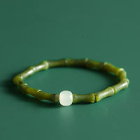 Armband „Glück und Fülle“ von KarmaRipple mit grünem Bambus-Jade-Muster