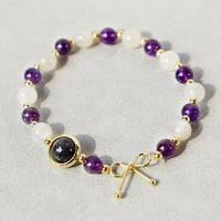 KarmaRipples spirituelles Perlenarmband mit Amethyst-Katzenauge und schwarzem Rutilquarz