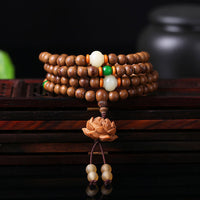 KarmaRipples 108 Mala-Perlenarmband mit Bodhi-Samen und Lotusblüte aus Pfirsichholz, Gebets- und Meditationsarmband
