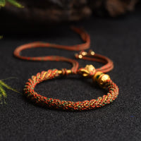KarmaRipples tibetisches handgefertigtes Glücks-Gebetsrad-Perlen-Talisman-Gewebe-Armband mit bunten Schnüren