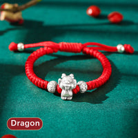 KarmaRipples handgefertigtes Kinderarmband aus 999er Sterlingsilber mit chinesischem Tierkreiszeichen und rotem Seil