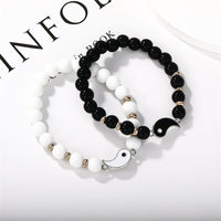 KarmaRipples 2-teiliges Armband mit schwarzen Onyx-Elfenbein-Türkis-Perlen und Yin-Yang-Schutzpaar