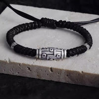 Segensseilarmband aus 999er Sterlingsilber mit neunäugigem Dzi-Perlenmuster von KarmaRipple