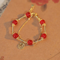 KarmaRipples Talisman-Armband zur Selbstakzeptanz aus rotem Achat mit Fu-Charakter