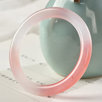 Reichtumsarmband aus rosa und goldener Seide und Jade von KarmaRipple