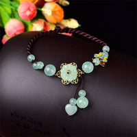 KarmaRipples Fußkettchen mit Blumen-Jade-Schmetterling und Glücksbringer