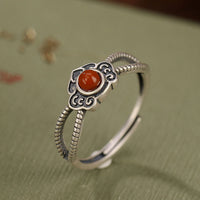 KarmaRipples Ring zum logischen Denken aus 925er Sterlingsilber mit roten Achatperlen