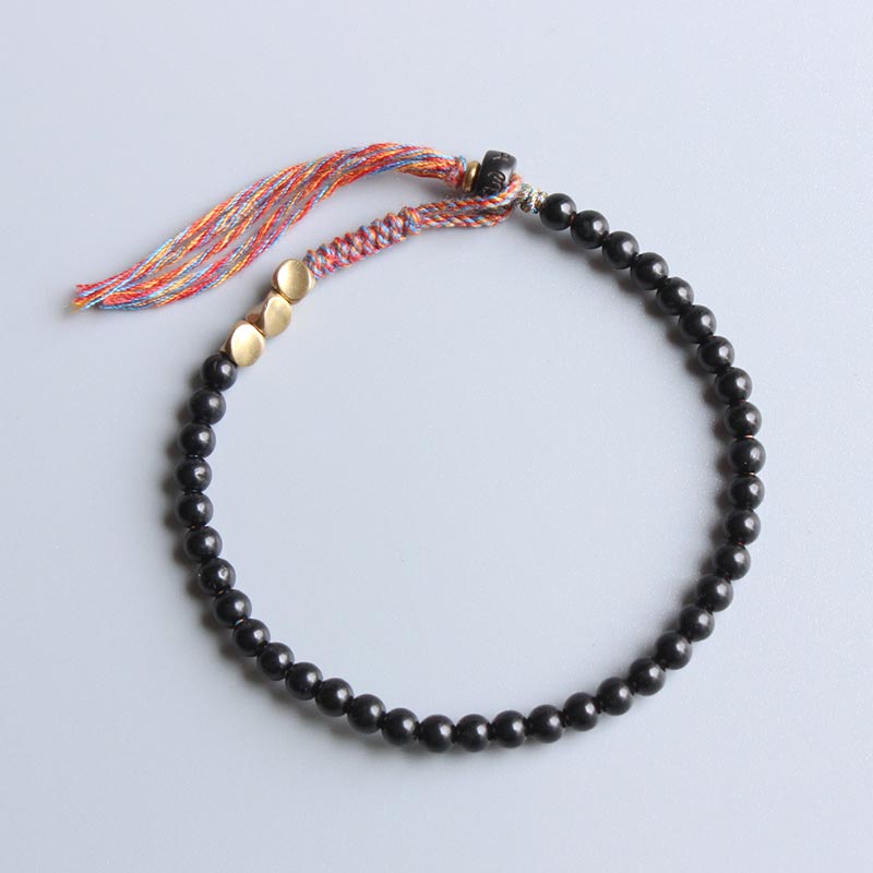 KarmaRipple's Handmade Tibetan Black Onyx Tassel Bracelet p1