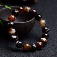 KarmaRipples tibetisches Sardonyx-Glücksarmband