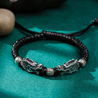 KarmaRipples handgefertigtes gewebtes Armband „Double Dragon Fortune“ aus 999er Sterlingsilber