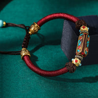 Handgefertigtes gewebtes Armband „Om Mani Padme Hum Strength“ von KarmaRipple aus tibetischem Türkis
