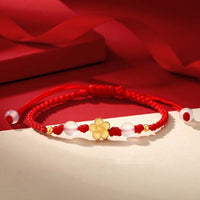 KarmaRipples handgefertigtes Armband aus 925er Sterlingsilber mit Pfirsichblüten-Kirsch-Sakura-Chalcedon-Perlen und rotem Seil