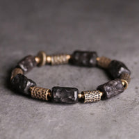KarmaRipples tibetisches Armband „Calm Peace“ aus Ebenholz und Bronze