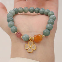 KarmaRipples Jade-Talisman-Wohlstandsarmband mit vierblättrigem Kleeblatt