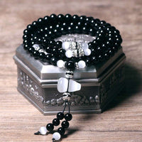 Meditationsarmband aus schwarzem Onyx und Elfenbein-Edelsteinperlen von KarmaRipple
