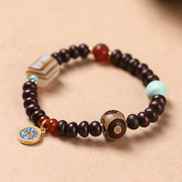 KarmaRipples authentisches tibetisches Armband mit lila Bodhi-Samen-Dzi-Perlen, Gott des Reichtums und der Weisheit