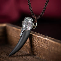KarmaRipples Halskette mit Anhänger aus 925er Sterlingsilber mit schwarzem Obsidian und Wolfszahnmuster
