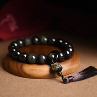 KarmaRipples authentische schwarze Obsidian-Löwen-Handgelenk-Mala mit Schutzquasten, Taschen-Mala, Auto-Dekoration