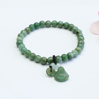 KarmaRipples Lachender Buddha Cyan Jade Ausgleichsarmband 