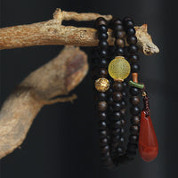 KarmaRipples 999 Gold Nha Trang Heiqinan Adlerholz Bernstein Roter Achat Kraft Meditationsarmband