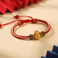 KarmaRipples handgefertigtes gewebtes Armband „Baby Dragon Fortune Strength“ aus 925er Sterlingsilber