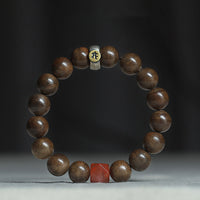 KarmaRipples Armband aus 925er Sterlingsilber mit chinesischem Tierkreiszeichen und Buddha-Statue aus Kalimantan-Adlerholz, rotem Achat und Bernstein