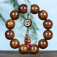 KarmaRipples Rosenholz-Armband „Wärme und Ruhe“ mit Kürbis-Talisman