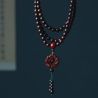 KarmaRipples tibetisches Lotus-Mala-Balance-Armband mit kleinen Blättern aus rotem Sandelholz