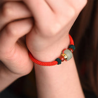 KarmaRipples tibetisches grünes Aventurin-Glücksarmband mit geflochtenen Schnüren